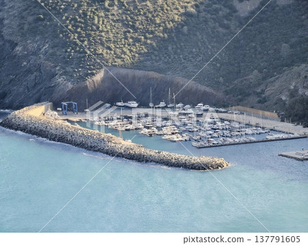 Peaceful Marina With Vibrant Activity, Reflective Turquoise Waters Surround Busy Waterfront Harbor 137791605