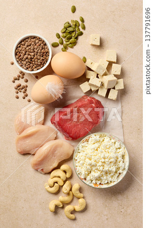 High protein foods assortment with chicken, beef, eggs, cottage cheese and nuts, top view 137791696