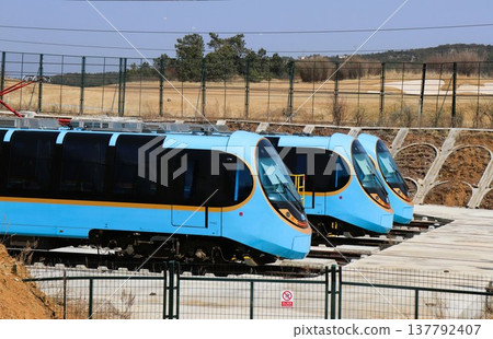 A train on the Yulong Xueshan Scenic Railway, which opened last year. Yulong Xueshan Station, Yunnan Province, China, Asia. 137792407