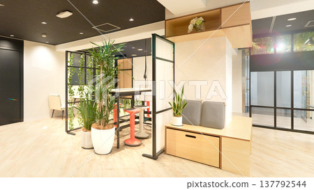An open office space that incorporates nature. 137792544