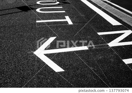 Brand new signage at the entrance/exit of a parking lot (b-5 monochrome) Brand new signage at the entrance/exit of a parking lot (b-5 monochrome) 137793074