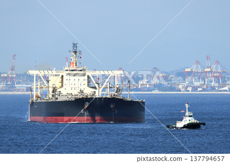 Crude oil tankers sailing under the escort of a patrol boat. Crude oil tankers sailing under the escort of a patrol boat. 137794657