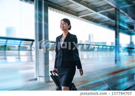 Female business people on business trips Female business people on business trips 137794707
