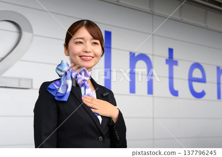 Cabin crew members give welcoming greetings. ■Filming assistance provided by: Kansai International Airport (KIX) 137796245