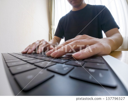 Up your hand to hit the keyboard of your computer Up your hand to hit the keyboard of your computer 137796327