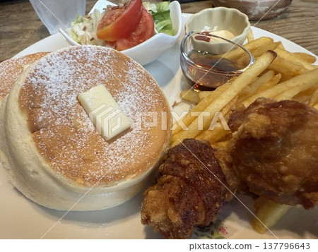Cafe lunch with pancakes, fried chicken, and potatoes Cafe lunch with pancakes, fried chicken, and potatoes 137796643