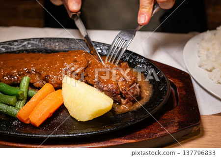 Men who eat steaks Men who eat steaks 137796833