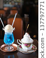 Cream soda and Viennese coffee. Snack time with friends at a cafe. 137797771