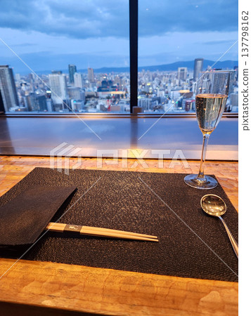 Champagne and the night view of Osaka Champagne and the night view of Osaka 137798162
