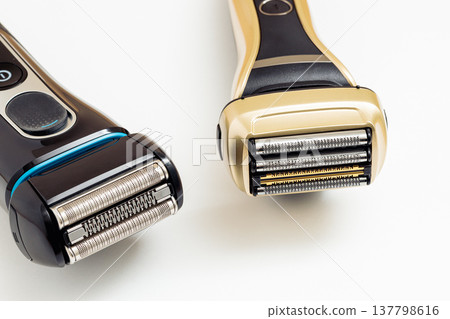 Close-up of two electric shavers 137798616