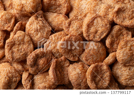Texture of raw textured vegetable protein (TVP) soy meat chunks, Food background Texture of raw textured vegetable protein (TVP) soy meat chunks, Food background 137799117