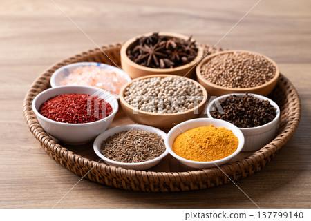 Cumin, turmeric powder, coriander seed, white peppercorn, chili powder, star anise and cinnamon Cumin, turmeric powder, coriander seed, white peppercorn, chili powder, star anise and cinnamon 137799140