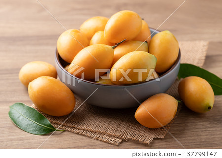 Fresh Marian plum (Mayongchid), Thai tropical fruit in summer season Fresh Marian plum (Mayongchid), Thai tropical fruit in summer season 137799147