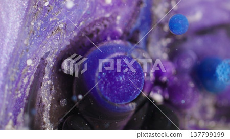 Paint stream. Ink spilling. Defocused blue purple white color water bubble dark black fluid floating on abstract bokeh art background. Paint stream. Ink spilling. Defocused blue purple white color water bubble dark black fluid floating on abstract bokeh art background. 137799199