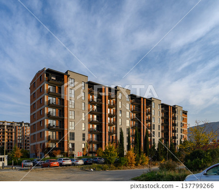 Close-Up of a Balcony of a Modern Residential Building with Metal Railings and Glazing. Architectural Detail. 137799266