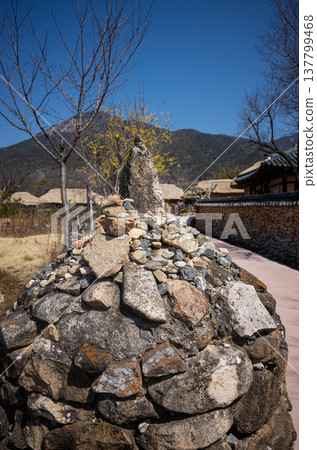 Stacked stones under blue sky 137799468