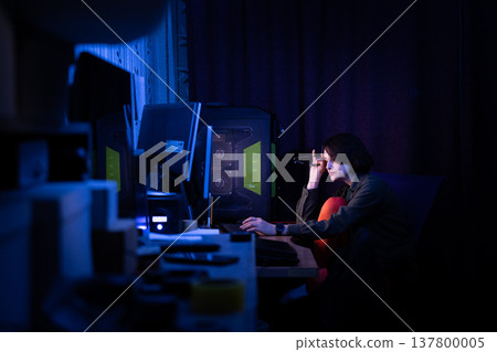 Tired woman rubbing eyes at her desk, depicting burnout and the struggle of creative writing deadlines. 137800005