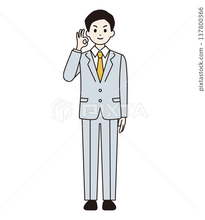 一名身穿西裝的男子麵帶微笑地做出「OK」手勢（全身照）。 137800366