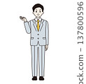 A man in a suit giving directions (full body) 137800596