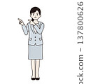 A woman in a suit pointing with both hands (full body shot) 137800626