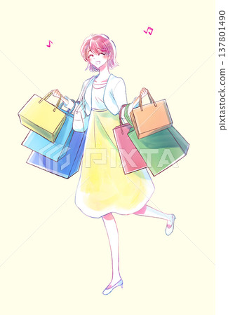 春天裡，一位女士提著許多購物袋。 137801490