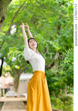 Fresh greenery, woman, mirror Fresh greenery, woman, mirror 137801757