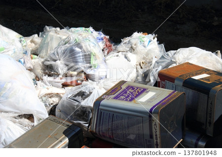 Discarded waste; an image illustrating industrial waste disposal. Discarded waste; an image illustrating industrial waste disposal. 137801948