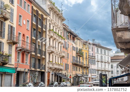 Milan, italy, april 1, 2024. Historic street with multi-colored buildings and traditional balconies in the charming brera district of milan urban architecture 137802752