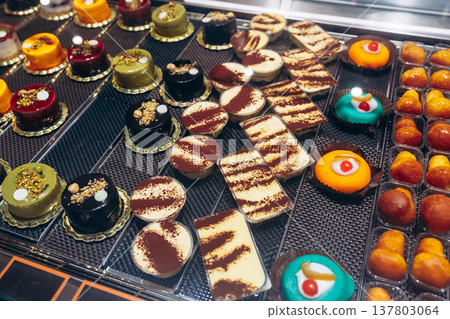 Baked goods are displayed in a shop on a busy day Baked goods are displayed in a shop on a busy day 137803064