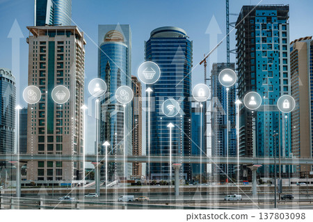 Modern buildings in a city with digital icons showing technology and growth 137803098