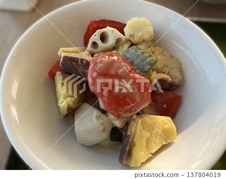Warm salad with sesame dressing Warm salad with sesame dressing 137804019
