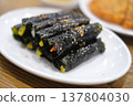 Freshly made kimbap from a Korean market 137804030