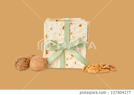 Traditional matzah with nuts and ribbon for Passover celebration 137804177