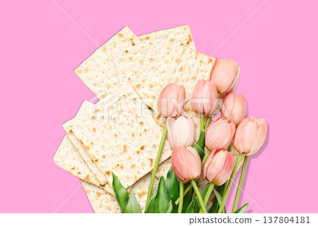 Matzah and tulips are arranged together for Passover celebration 137804181