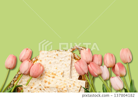 Matzah is arranged with pink tulips for Passover festivities 137804182