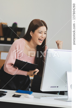 Starting small businesses SME owners female entrepreneurs check online orders to prepare to pack the boxes, sell to customers, sme business ideas online. Starting small businesses SME owners female entrepreneurs check online orders to prepare to pack the boxes, sell to customers, sme business ideas online. 137804260