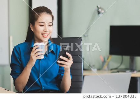 Young Asian businesswoman giving presentation Young Asian businesswoman giving presentation 137804333
