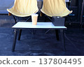 Ice coffee on table and camping chairs. 137804495