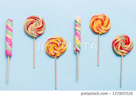 Set of colorful lollipops on colored background. Summer concept. Party Happy Birthday or Minimalist Concept 137805526