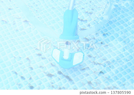 pool vacuum cleaner in the water. dirty pool water surface, season luxury life concept top view 137805590