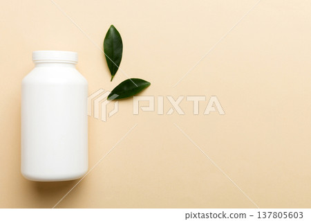 supplement pills with medicine bottle health care and medical top view. Vitamin tablets. Top view mockup bottle for pills and vitamins with green leaves, natural organic bio supplement, copy space supplement pills with medicine bottle health care and medical top view. Vitamin tablets. Top view mockup bottle for pills and vitamins with green leaves, natural organic bio supplement, copy space 137805603