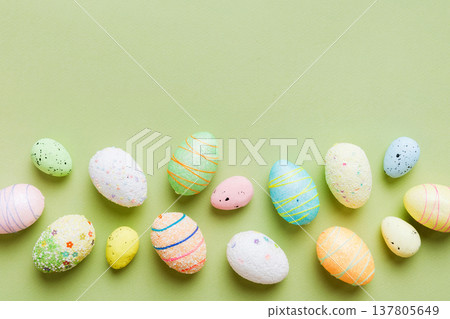 decorative easter eggs on colored background. easter eggs collection top view with copy space 137805649
