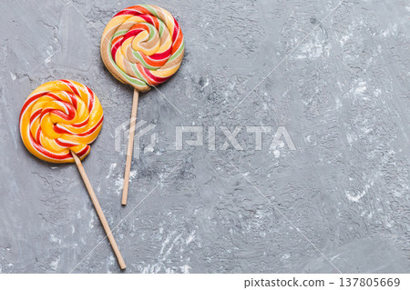 Set of colorful lollipops on colored background. Summer concept. Party Happy Birthday or Minimalist Concept 137805669