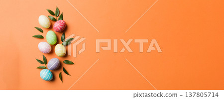 Colorful Easter eggs with spring flower leaf isolated over white background. Colored Egg Holiday border Colorful Easter eggs with spring flower leaf isolated over white background. Colored Egg Holiday border 137805714