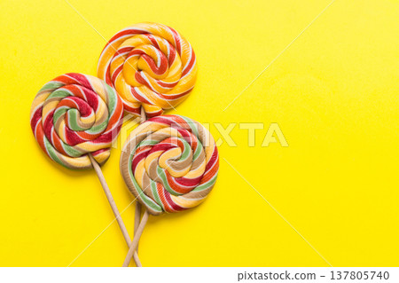 Set of colorful lollipops on colored background. Summer concept. Party Happy Birthday or Minimalist Concept 137805740