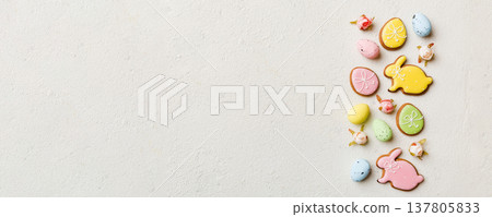 Happy Easter concept. Preparation for holiday. Easter eggs on colored background. flat lay top view copy space banner Happy Easter concept. Preparation for holiday. Easter eggs on colored background. flat lay top view copy space banner 137805833