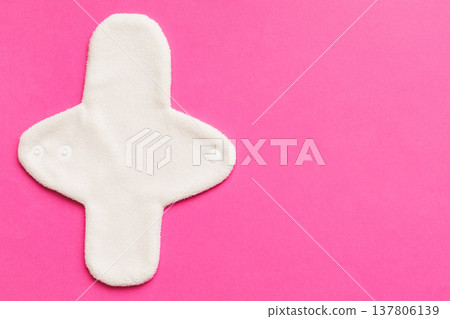 Eco-friendly reusable fabric women's pads. set of colorful bright reusable menstrual pads. zero waste woman periods concept top view with copy space Eco-friendly reusable fabric women's pads. set of colorful bright reusable menstrual pads. zero waste woman periods concept top view with copy space 137806139