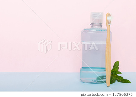 Mouthwash and fresh mint on colored background, top view with copy space for text 137806375