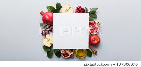 Flat lay composition with Blank flyer poster and symbols jewish Rosh Hashanah holiday attributes on colored background, New Year holiday Traditional. Top view with copy space mock up Flat lay composition with Blank flyer poster and symbols jewish Rosh Hashanah holiday attributes on colored background, New Year holiday Traditional. Top view with copy space mock up 137806376