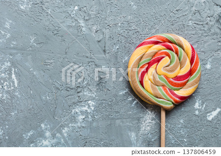 Set of colorful lollipops on colored background. Summer concept. Party Happy Birthday or Minimalist Concept 137806459